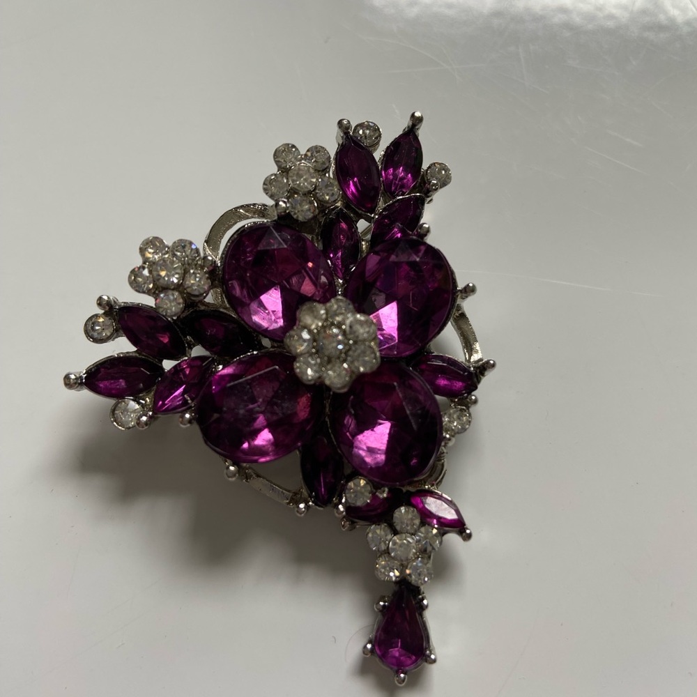 Unsigned brooch with purple and white stones. Little flowers. Vintage